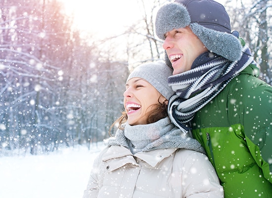Winter couple. Happy Couple Having Fun Outdoors. Snow. Winter Vacation. Outdoor